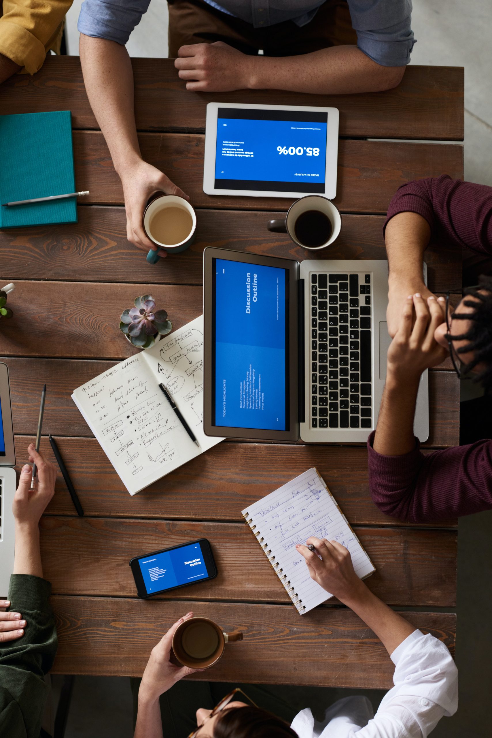 top-view-photo-of-people-having-a-meeting-3183165