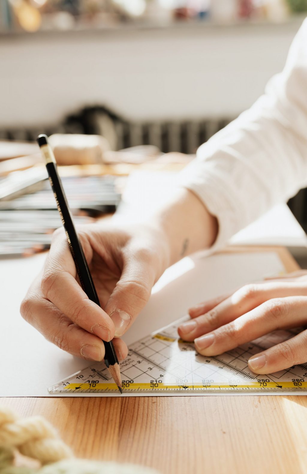 person-writing-on-white-paper-4219527